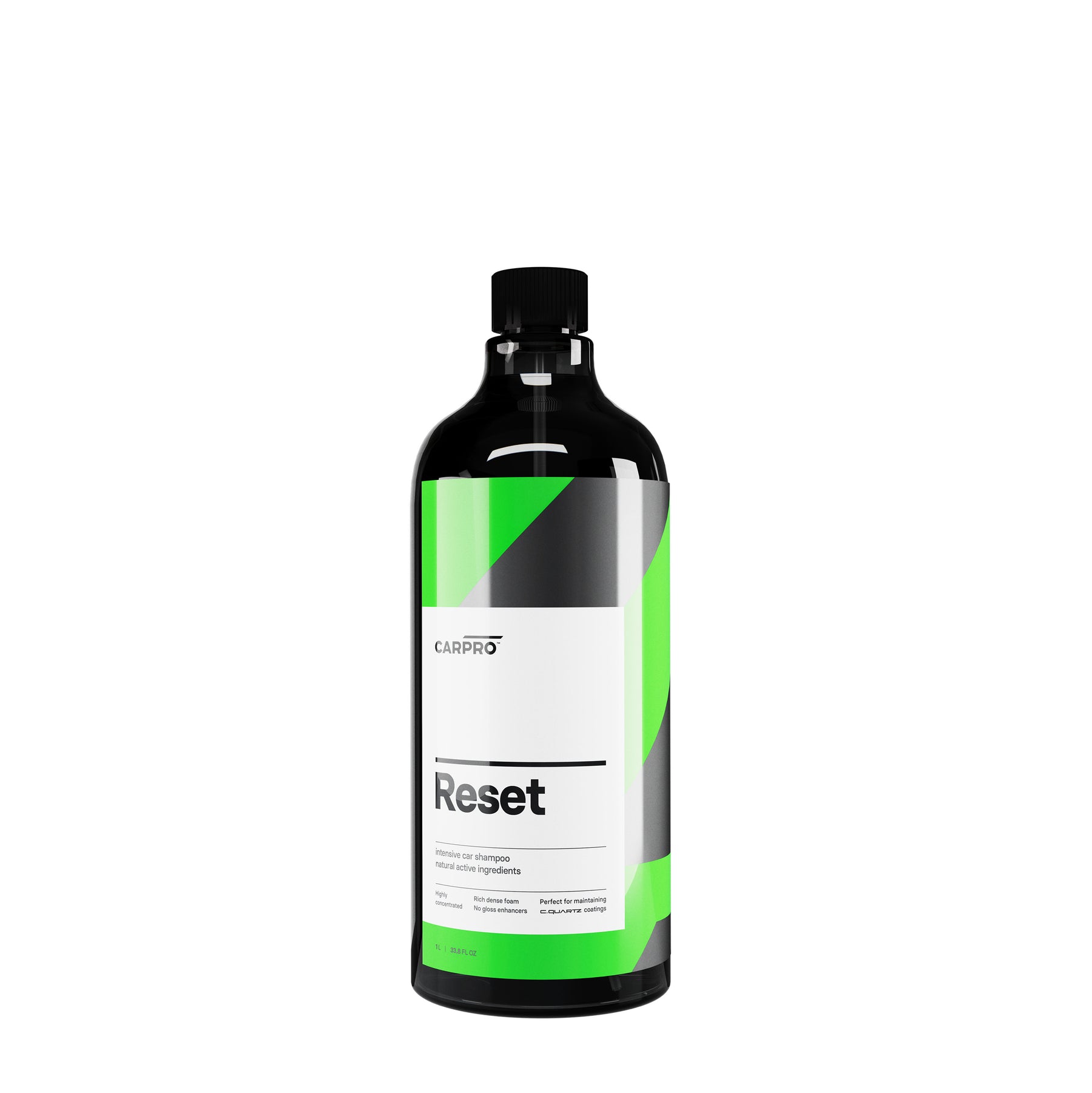 Flacone di CARPRO Reset, uno shampoo neutro con etichetta bianca, nera e verde, progettato per la pulizia delle auto mantenendo gli ingredienti protettivi, ideale per un lavaggio efficace e sicuro.
