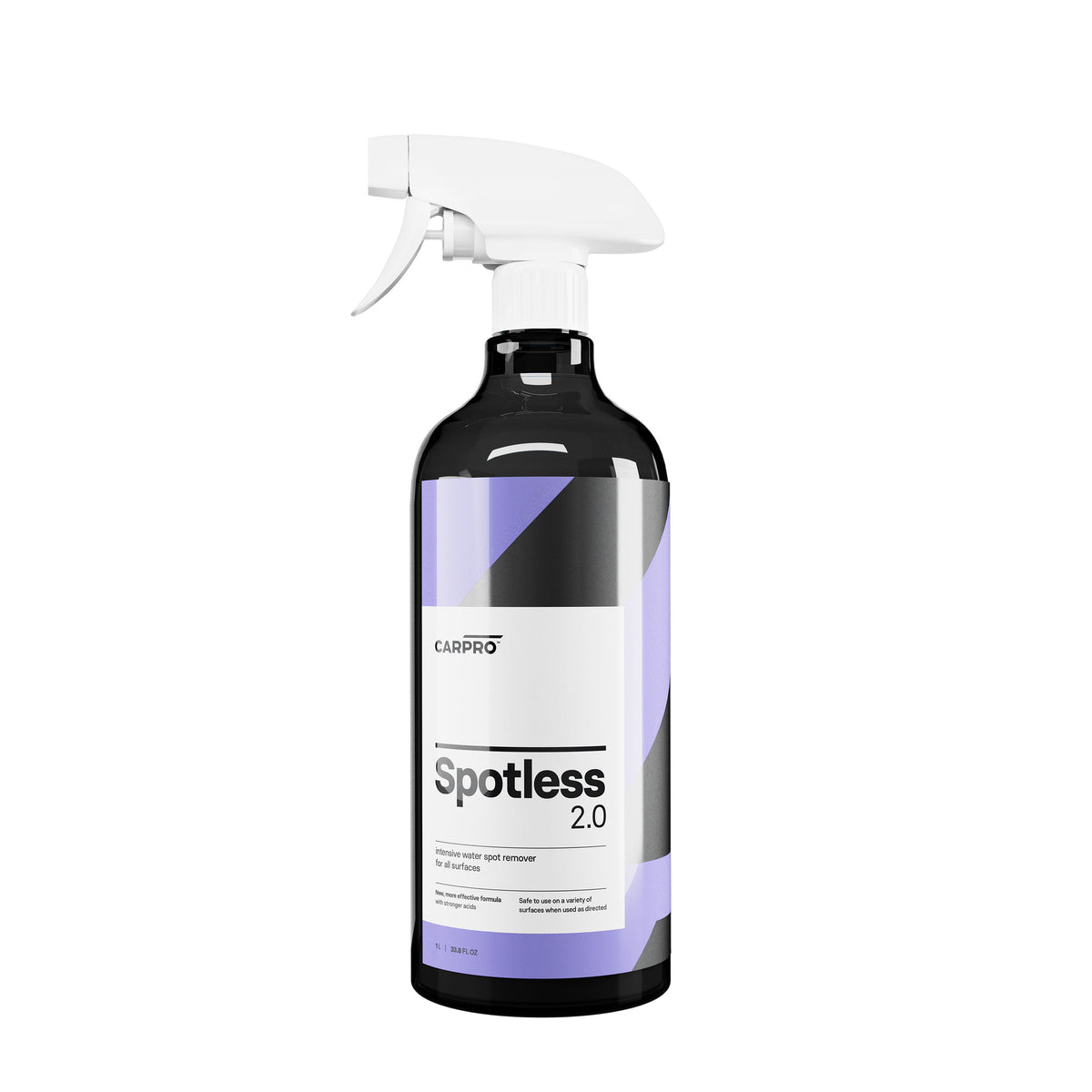 Grande bottiglia spray di CARPRO Spotless 2.0 detergente per rimozione macchie di calcare, con etichetta bianca e viola, su sfondo bianco.