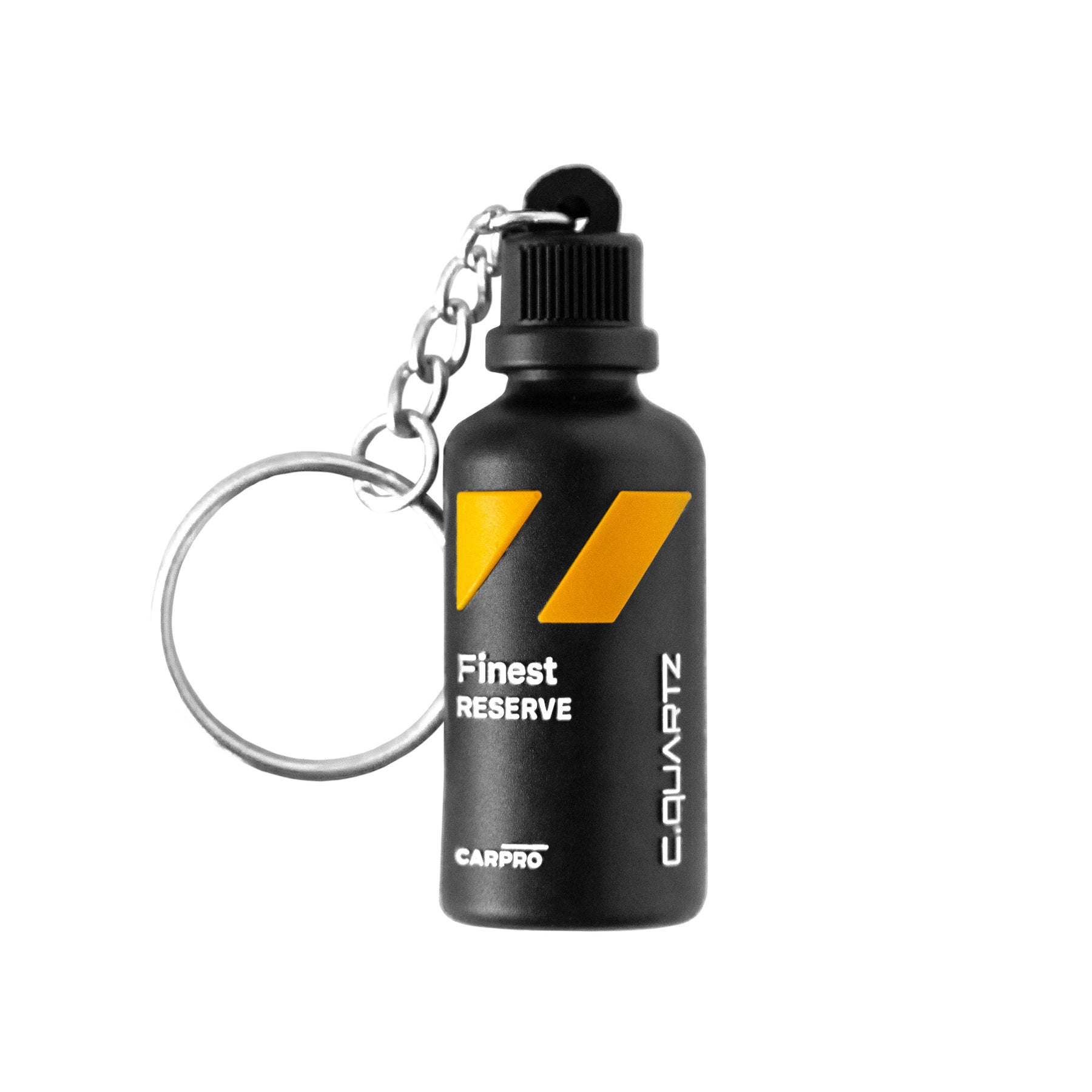 Portachiavi CARPRO Finest Reserve a forma di flacone nero con dettagli gialli e anello metallico, su sfondo bianco.