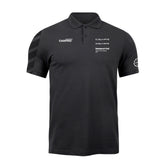 Polo nera CARPRO con loghi C.QUARTZ e D.QUARTZ sulla parte anteriore, ideale per professionisti del detailing.