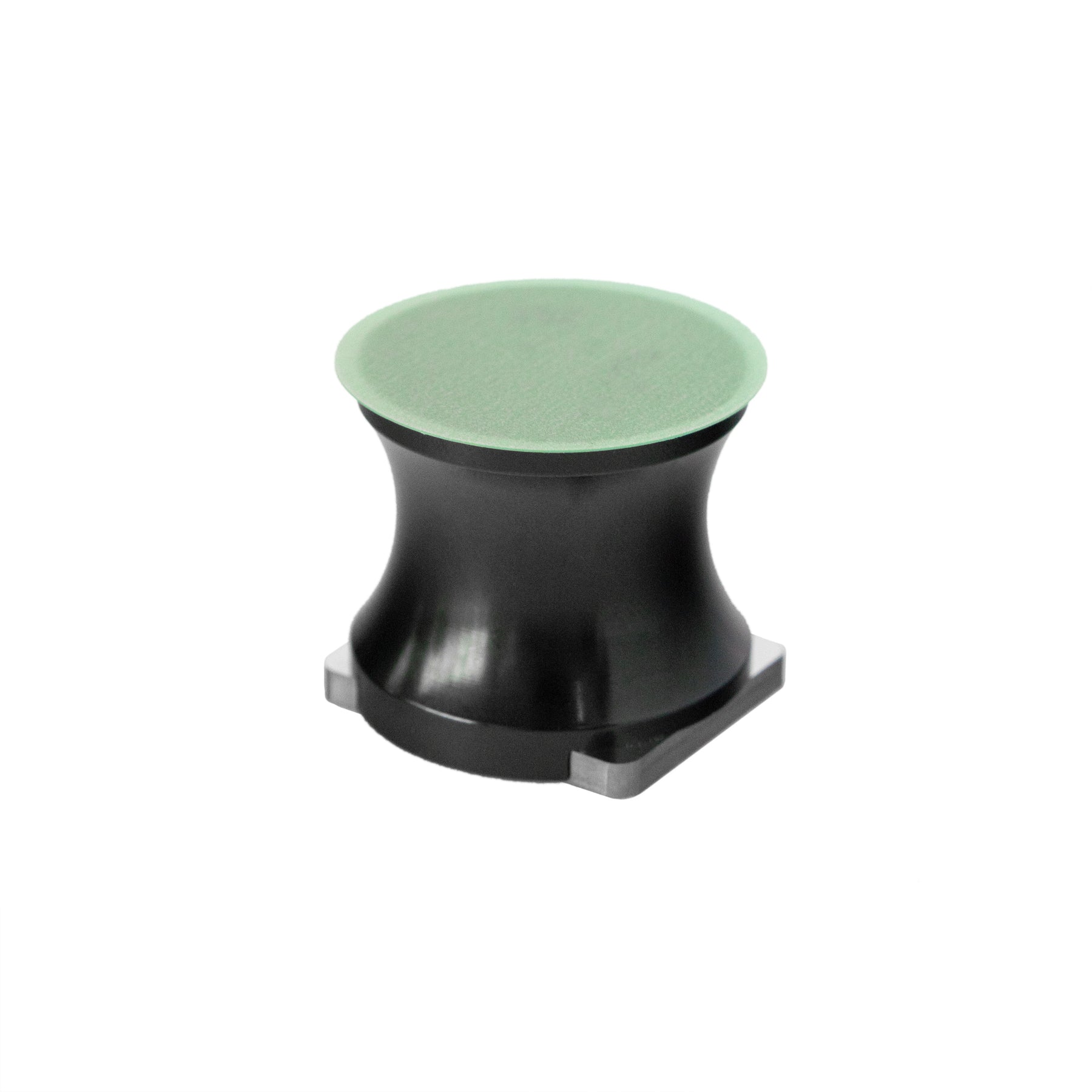 XBLADE Holder Carismatix con disco abrasivo verde montato sul lato PSA, ideale per rifiniture precise nella correzione di difetti di verniciatura.