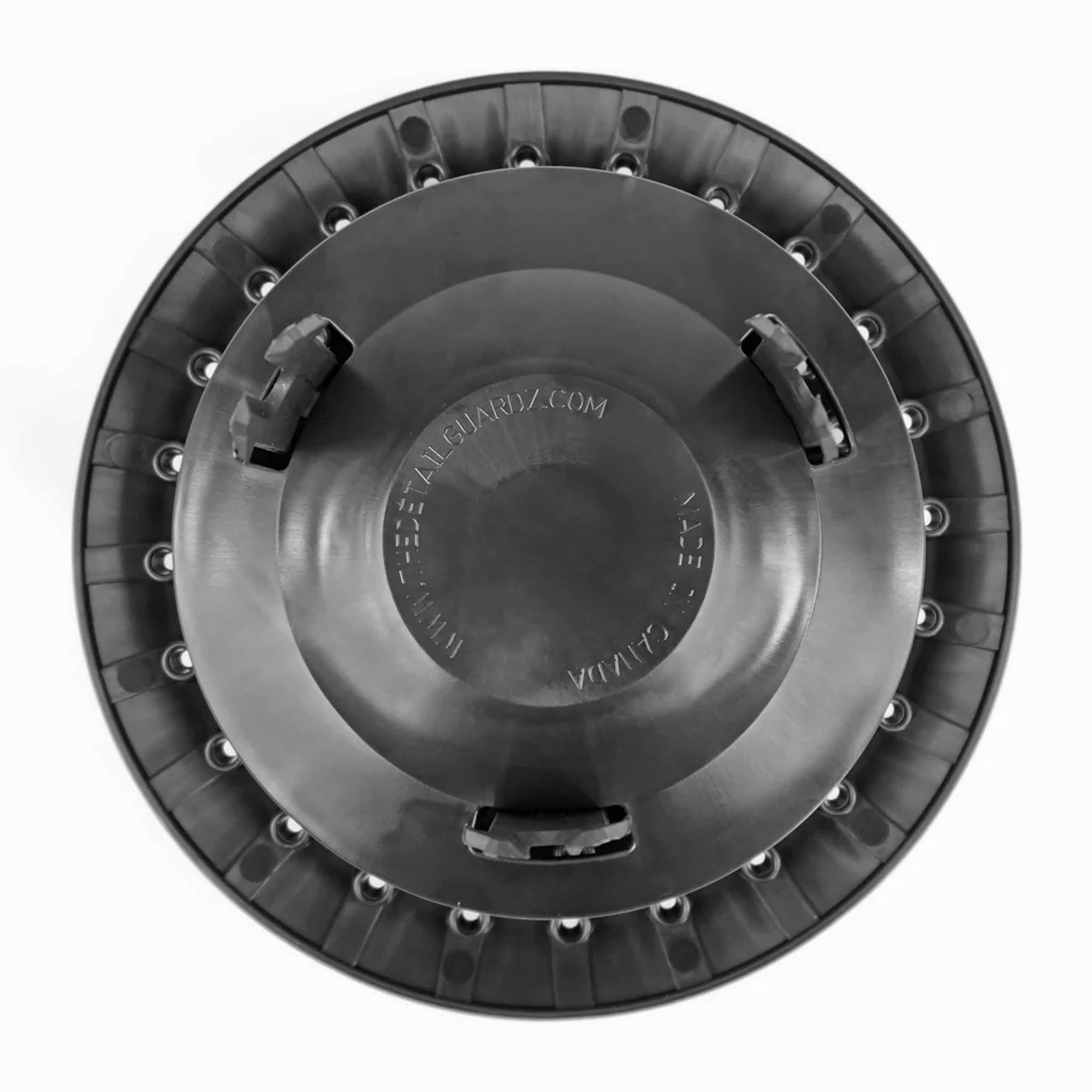 Vista inferiore del sistema Scrub and Pump Detail Guardz, con agganci in plastica e base nera, progettato per una pulizia efficace degli strumenti.