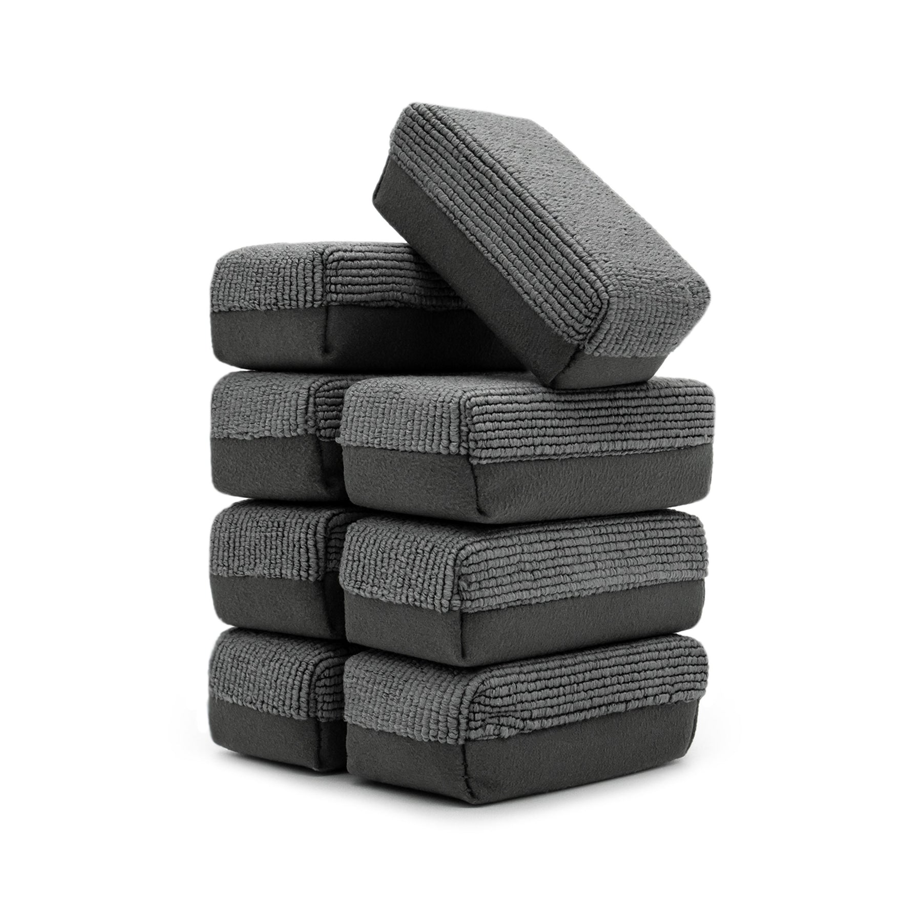 Set di applicatori Barrier Sponge grigie impilate, ideali per applicazioni uniformi di prodotti durante il detailing auto, offrendo protezione e cura delle superfici.