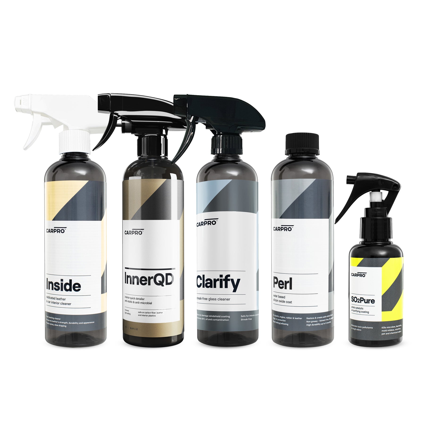 Set di cinque flaconi CARPRO per la pulizia e protezione degli interni auto, inclusi Inside, InnerQD, Clarify, Perl e SO2Pure, dotati di spruzzatori per un'applicazione facile ed efficace.