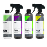 Set di quattro flaconi CARPRO per il lavaggio di mantenimento auto: Lift, uno shampoo schiumogeno per prelavaggio; IronX, un detergente per contaminazioni ferrose; Reset, uno shampoo neutro per la pulizia; e EliXir, un quick detailer per finiture rapide e brillanti.