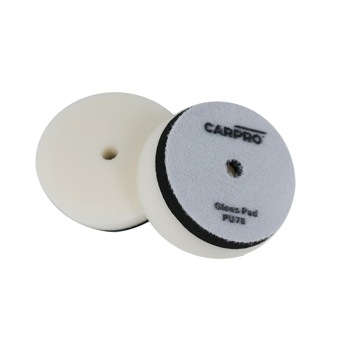 due CARPRO Gloss Pad bianchi. Uno è visto dall'alto con il logo CARPRO e l'altro è visto di lato per mostrare lo spessore. I pad sono progettati per la lucidatura, con un foro centrale per il montaggio.