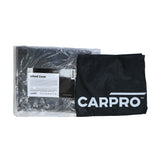 Confezione di CarPro Wheels Cover per proteggere le ruote durante il detailing, con coperture nere resistenti e logo CarPro.