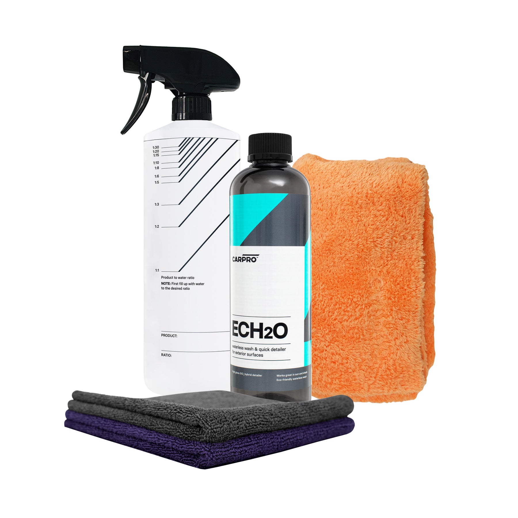 Kit CARPRO Lavaggio Waterless con bottiglia di spray, flacone di ECH2O, e panni in microfibra arancioni e azzurri, progettato per una pulizia auto senza acqua, rapida ed efficace, lasciando la superficie lucida e protetta.
