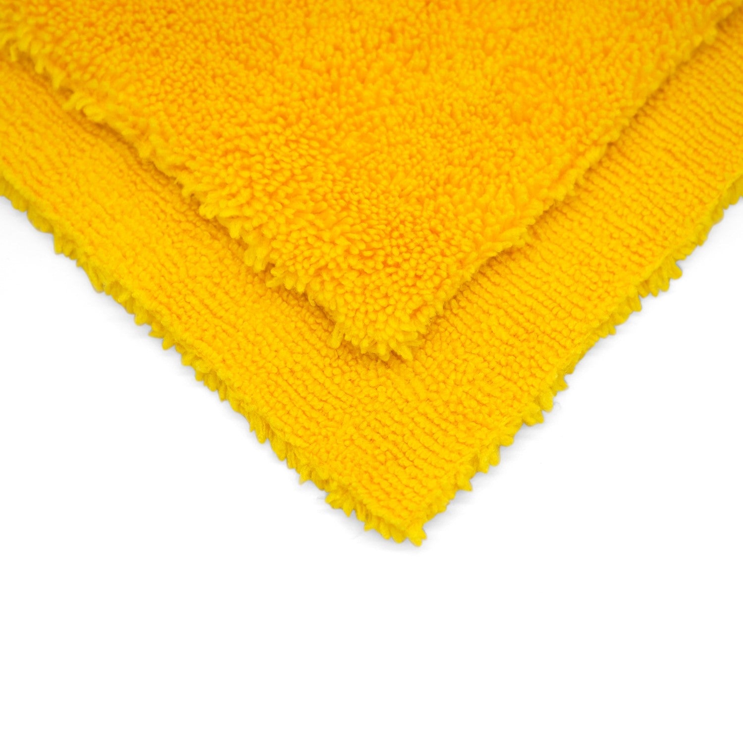 Dettaglio di un panno in microfibra giallo Dual Pile 420, con doppio strato per una pulizia efficace e una finitura senza aloni delle superfici auto.