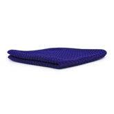 Panno in microfibra Waffle 450 blu, piegato, con trama a nido d'ape.