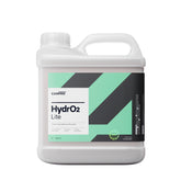 mostra un contenitore da 4 litri di CARPRO HydrO2 Lite, un sigillante idrofobico per la protezione della carrozzeria dell'auto. Il contenitore è bianco con un'etichetta verde e grigia, riportante il nome del prodotto "HydrO2 Lite". Questo prodotto è formulato per offrire una protezione avanzata con una facile applicazione spray, mantenendo la brillantezza e la protezione della superficie dell'auto.