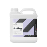 Tanica di CARPRO Spotless 2.0 detergente per rimozione macchie di calcare, con etichetta bianca e viola, su sfondo bianco.