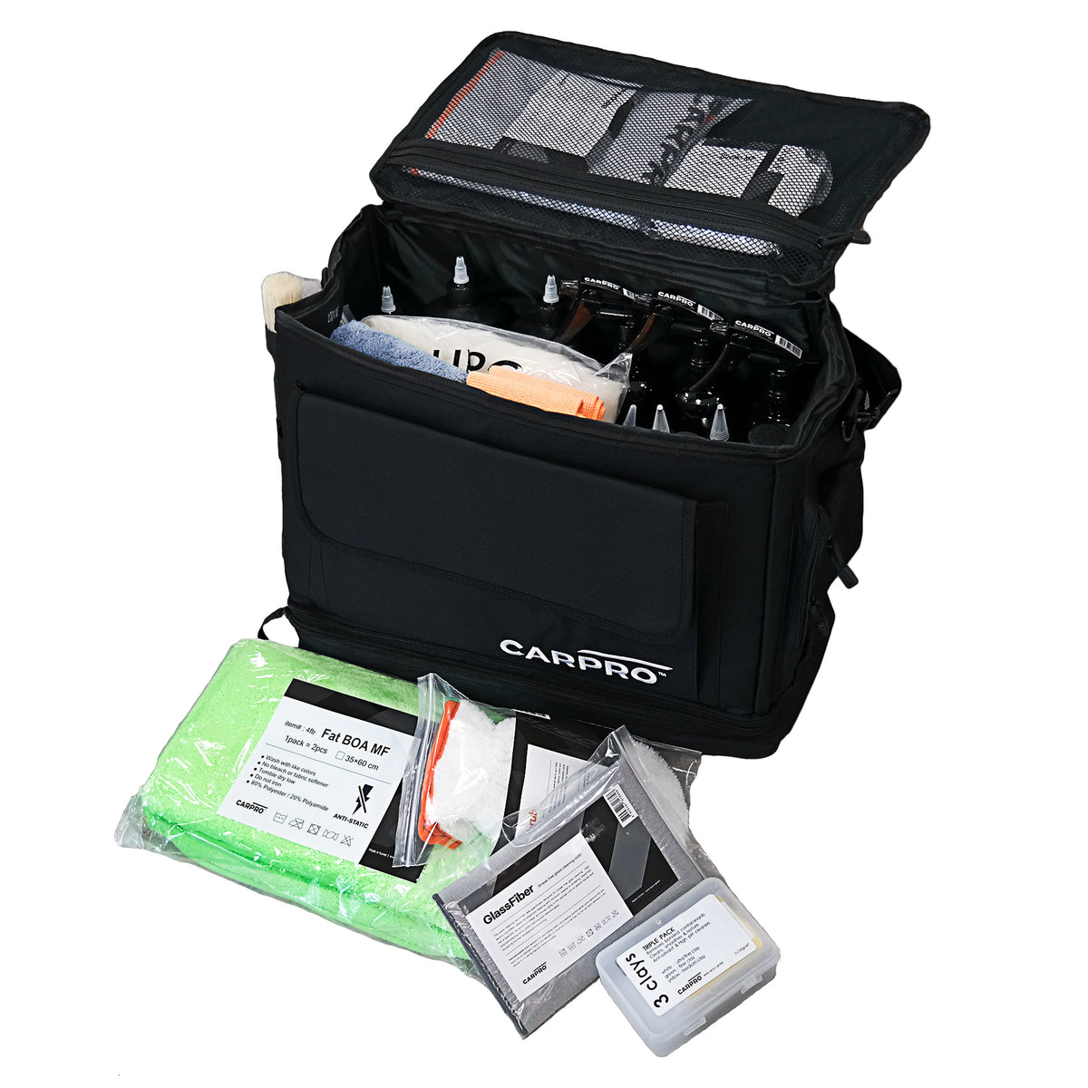 Kit completo per la cura dell'auto CARPRO con borsa, panni in microfibra, pennelli e prodotti per la pulizia.